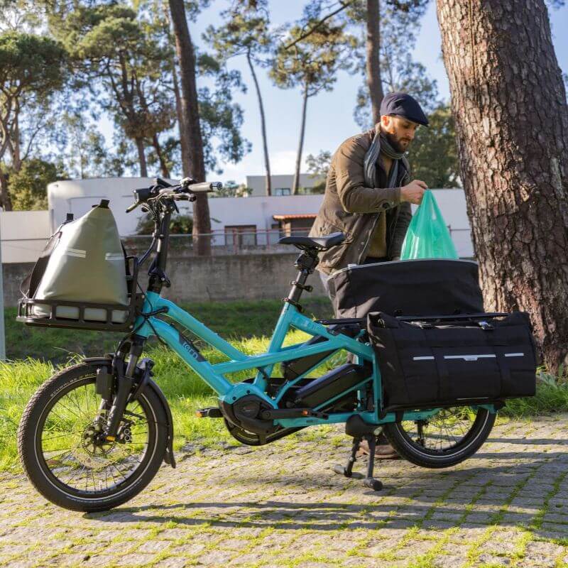 Canadian cargo eBike rider on urban cycling route, Scooteretti Ottawa