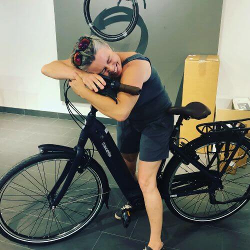 Customer picking up a new electric bike at Scooteretti in Ottawa Ontario