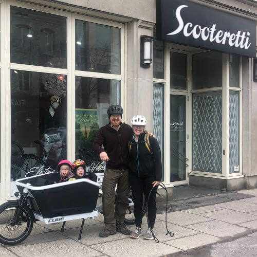 Family with children collecting a cargo electric bike at Scooteretti Ottawa