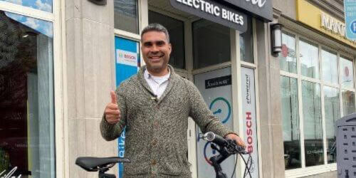 Ottawa commuter with ebike bought at Scooteretti