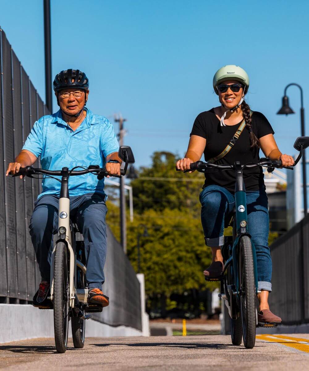 Rider on a Gazelle Easyflow C7 showing the feet-flat-on-ground stability feature.
