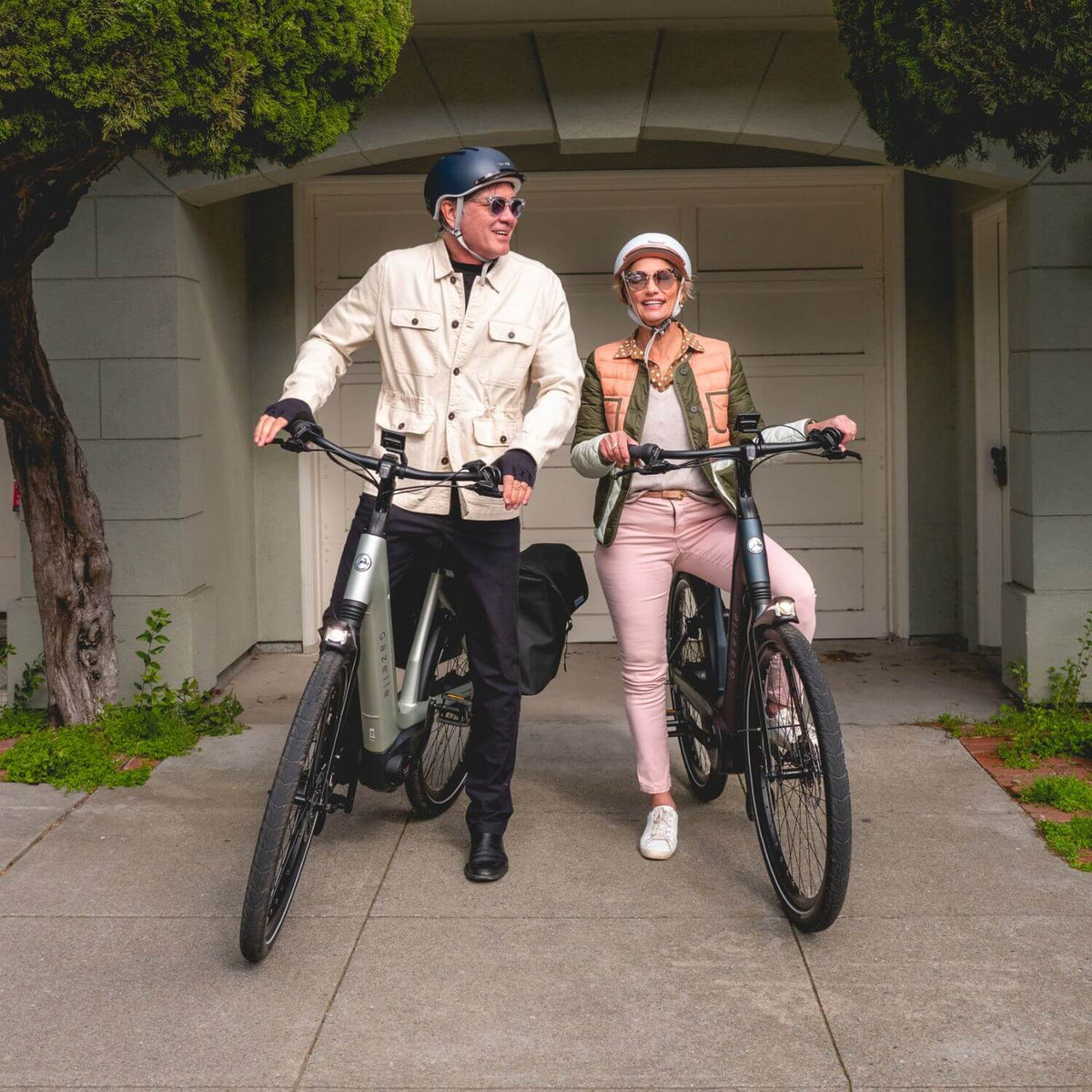 couple riding electric bicycles in victoria canada