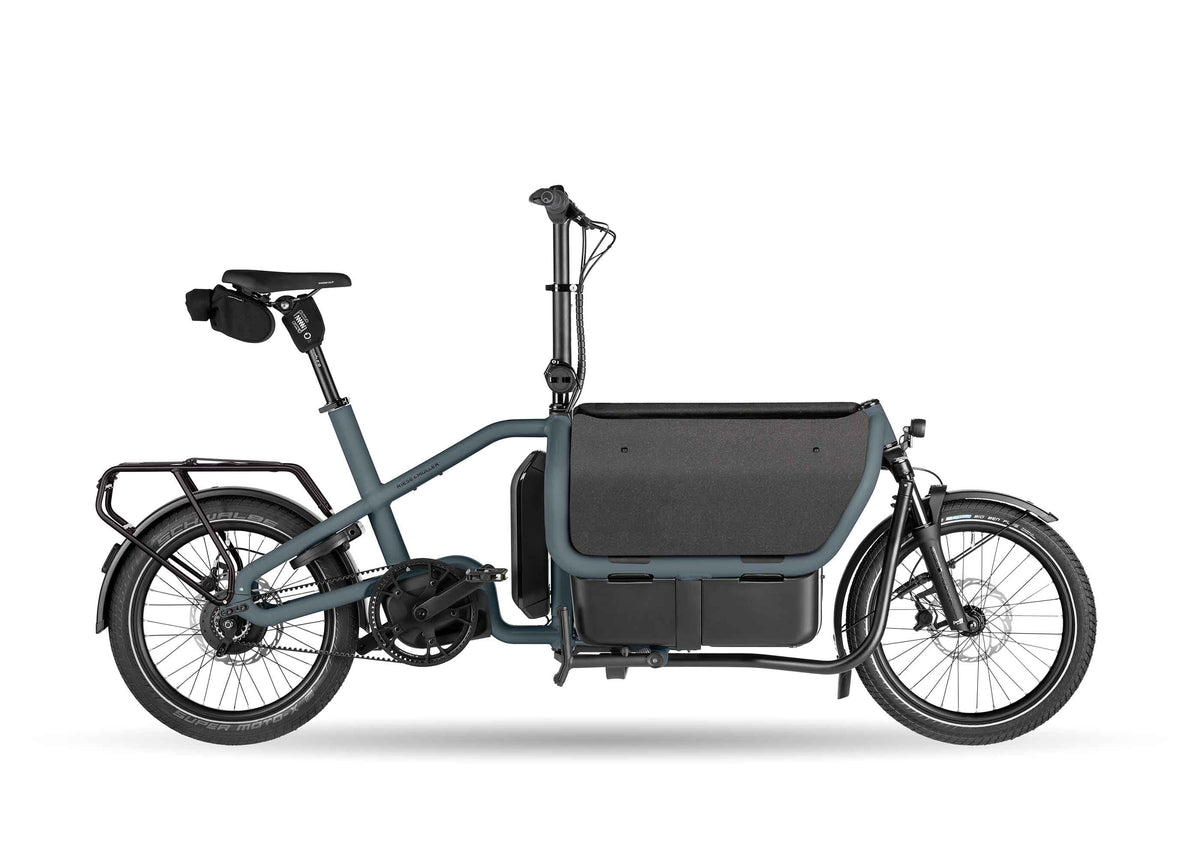 Riese & Müller Carrie2 Vario 2027 electric cargo bike in the new Denim colour with Gates CDX belt drive, studio photo